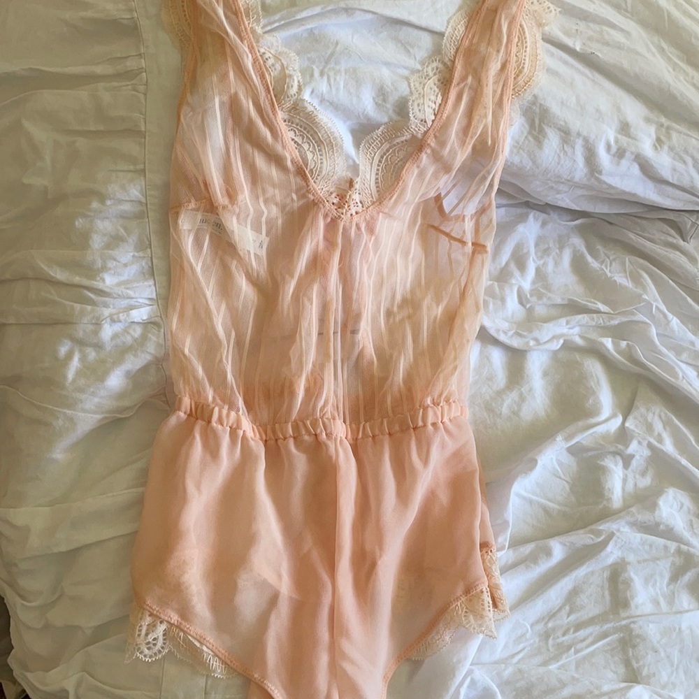 Pink lingerie romper
